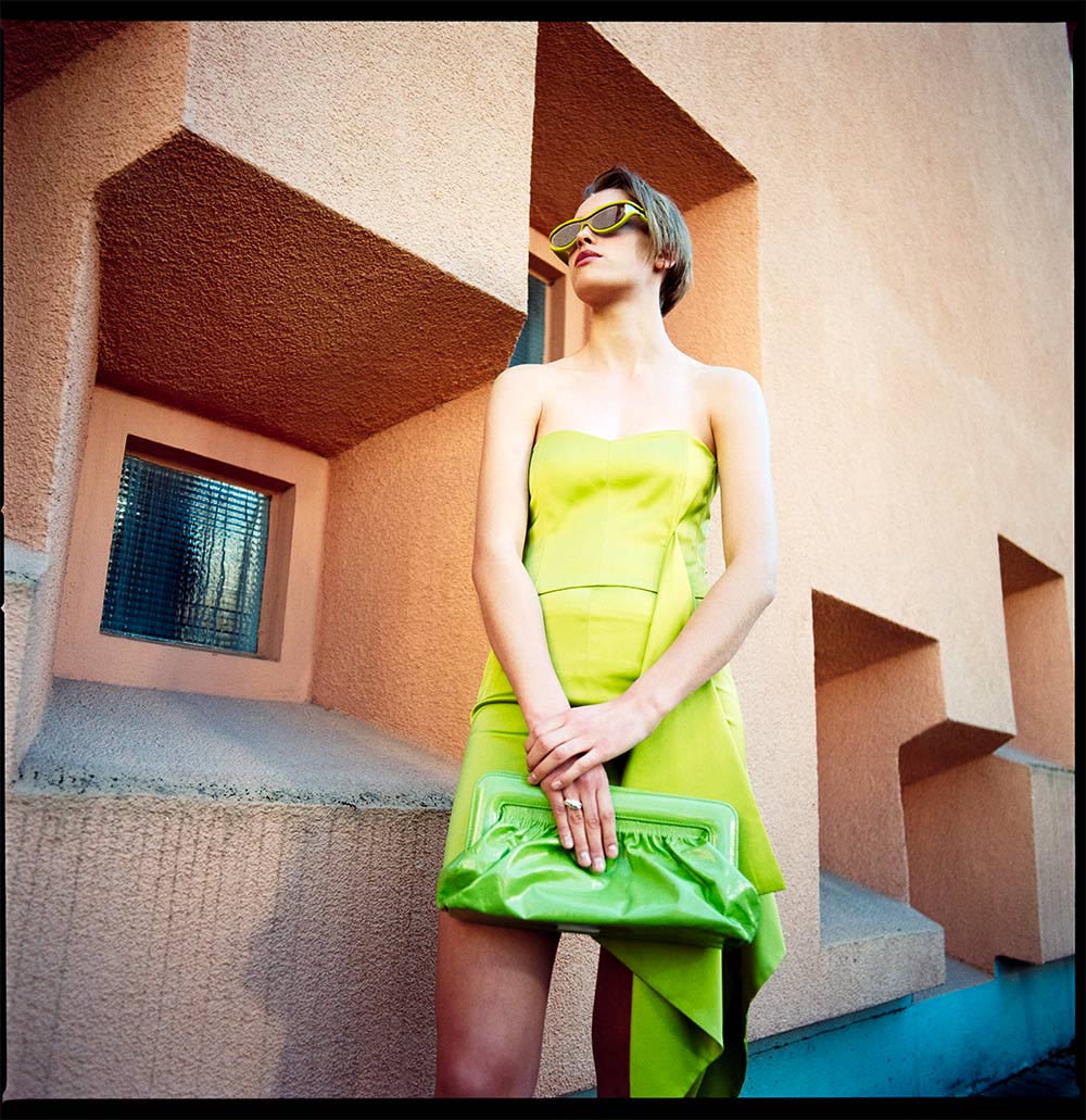 Photo by Oliver Rauh. Top, skirt and clutch from GESTUZ. Sunglasses from BOTTEGA VENETA. Ring from DODO.