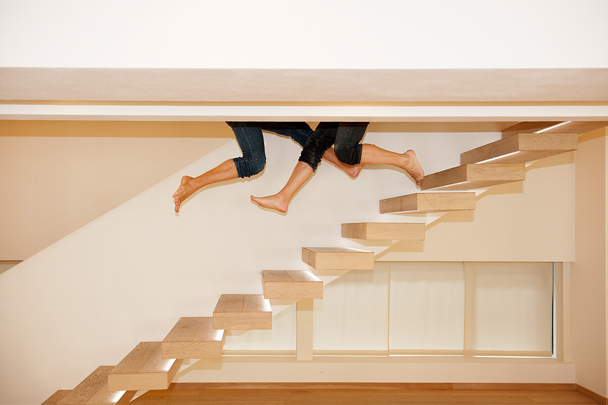 Picture by Matteo Thun. Staircase with floating legs.