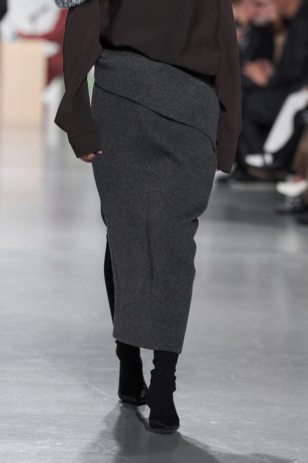Grey knit midi skirt with ankle boots by CFCL