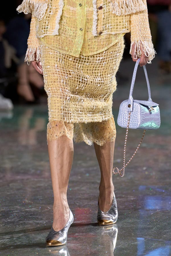 Yellow mesh tweed skirt with lace petticoat by Chanel