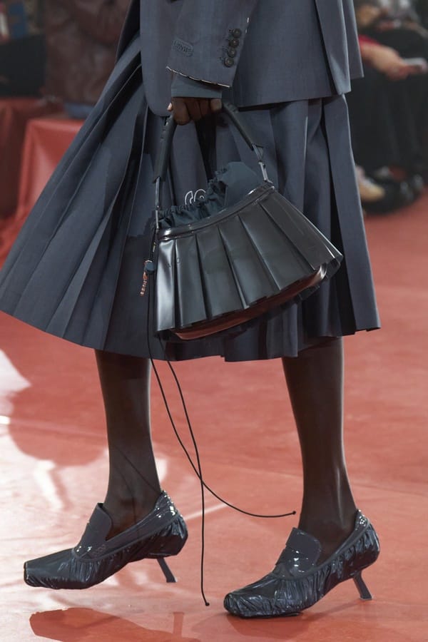 Grey pleated skirt with blazer by Lacoste