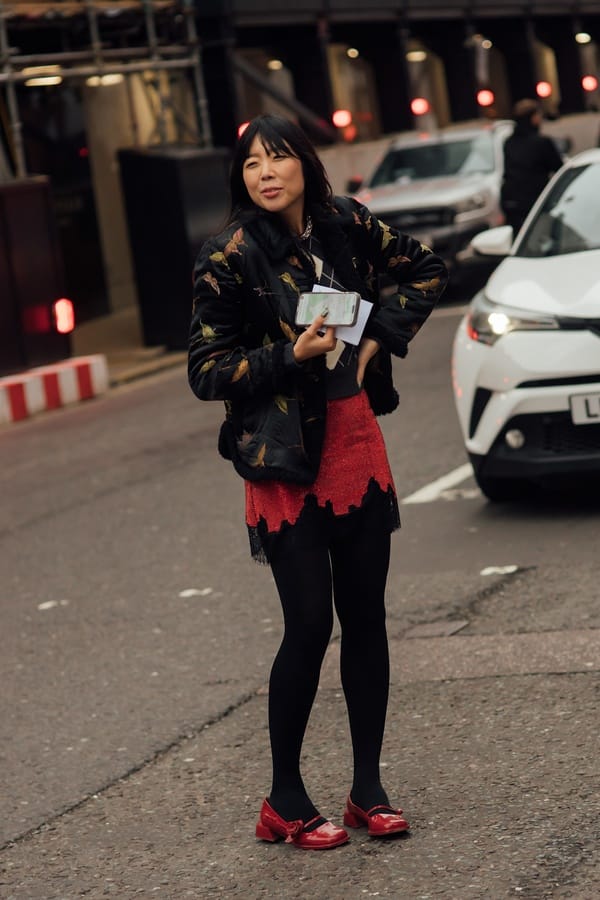 Red mini skirt with lace hem, tights, and red ballet flats, Streetstyle London