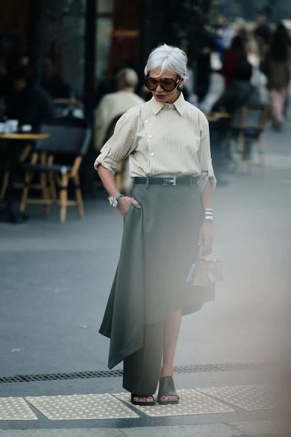 Olive green asymmetrical skirt with striped blouse in Paris