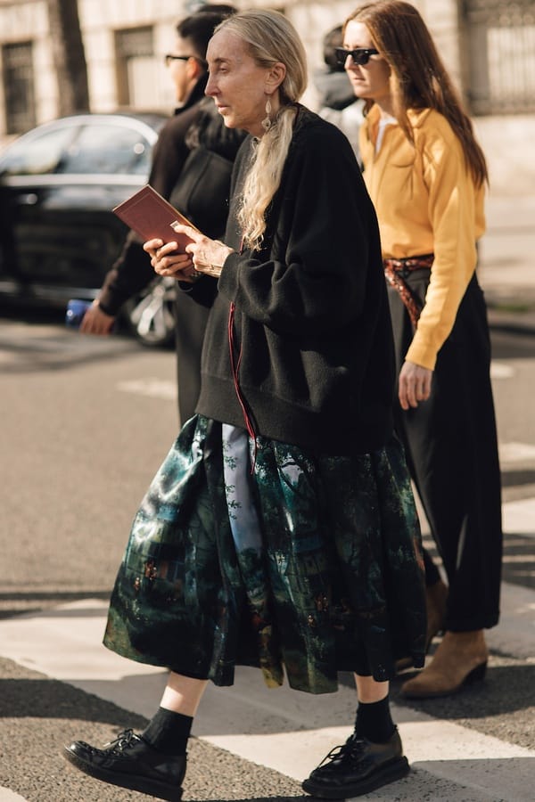 Patterned midi skirt with black sweatshirt and lace-up shoes, Streetstyle Paris