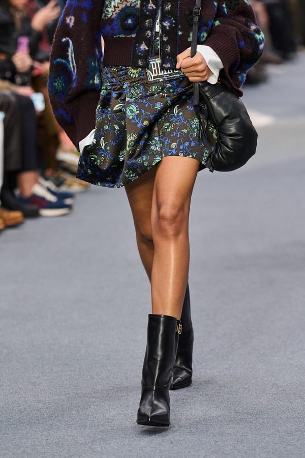 Floral mini skirt with cardigan and ankle boots by Sacai